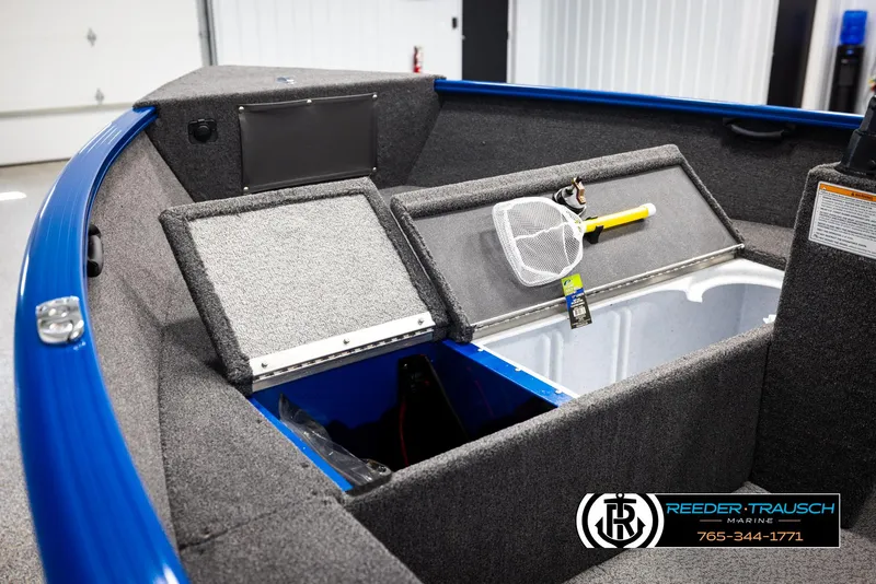Slide: The Image of Interior of 2025 Lund Rebel XL SS boat with storage compartments and fishing net. - 17