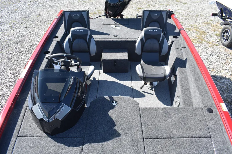 Slide: The Image of 2026 Lund 1875 Renegade boat interior with dual seats and steering console. - 10
