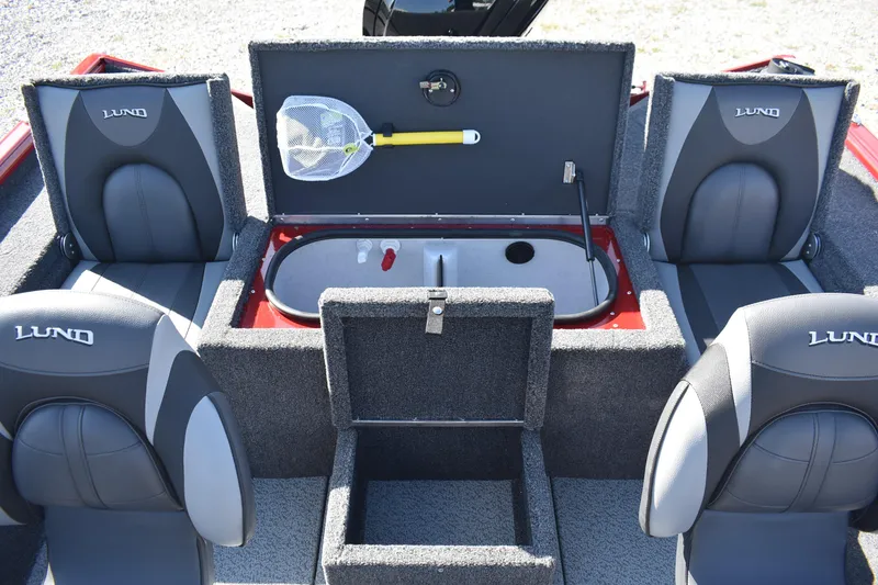 Slide: The Image of 2026 Lund 1875 Renegade boat interior with seating and storage compartments. - 8