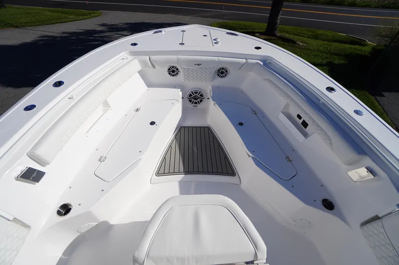 Slide: The Image of 2026 Tidewater 272 LXF boat interior with spacious seating and modern design. - 12