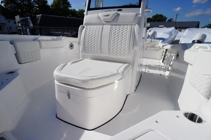 Slide: The Image of 2026 Tidewater 272 LXF boat interior with luxurious white seating and modern design. - 18