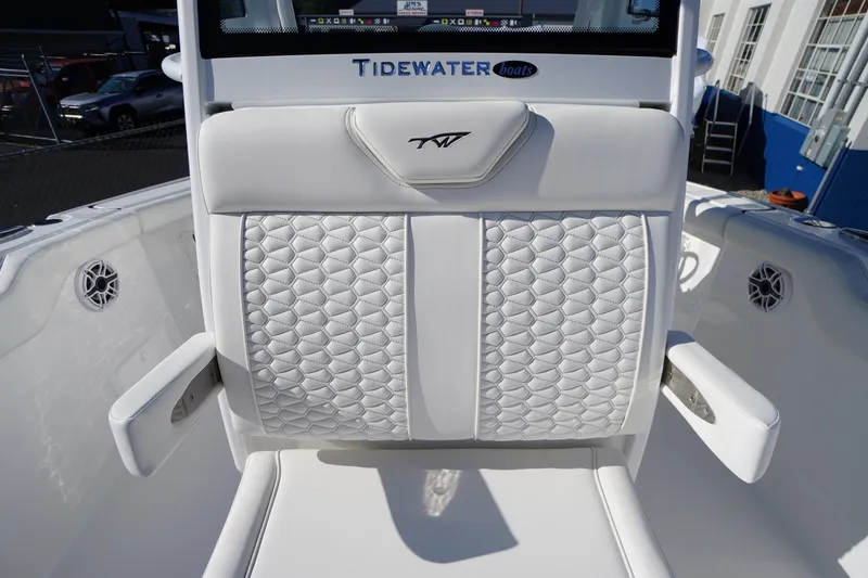 Slide: The Image of 2026 Tidewater 272 LXF boat with luxurious white quilted seating. - 20