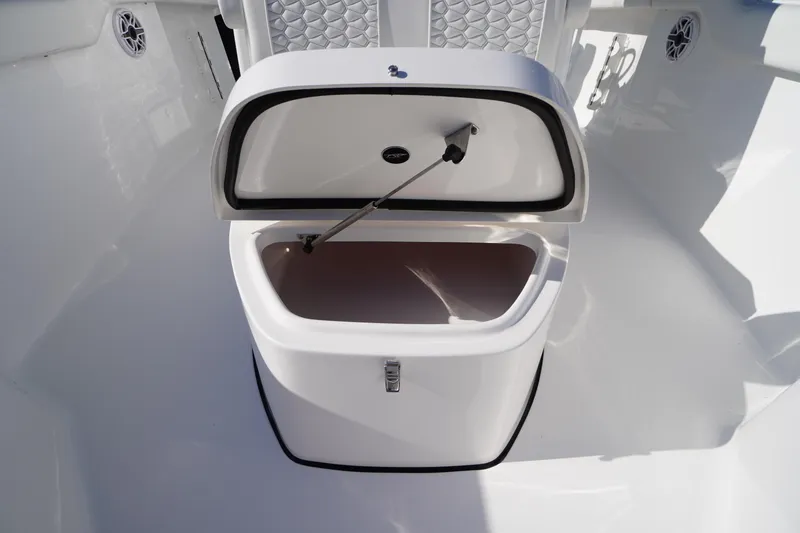 Slide: The Image of Open storage compartment on 2026 Tidewater 272 LXF boat, featuring sleek design and functionality. - 21