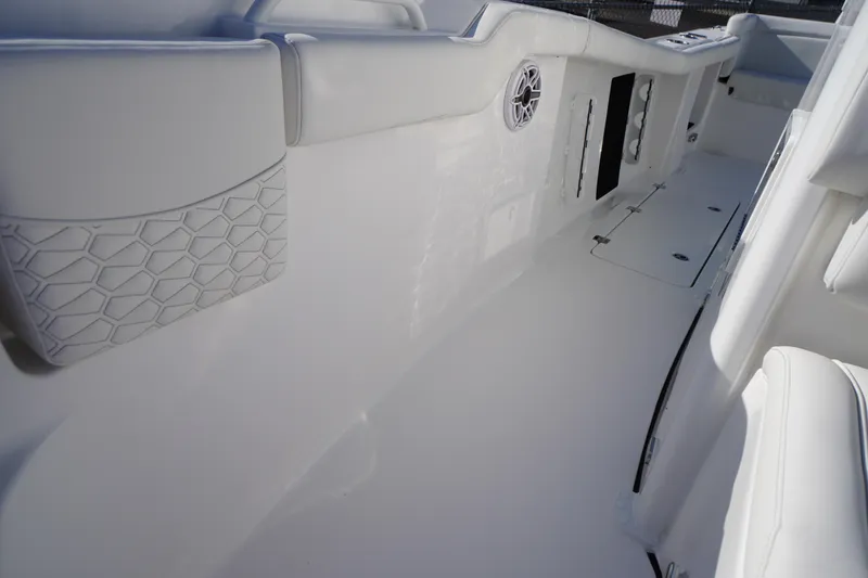 Slide: The Image of 2026 Tidewater 272 LXF boat interior with white seating and modern design. - 22