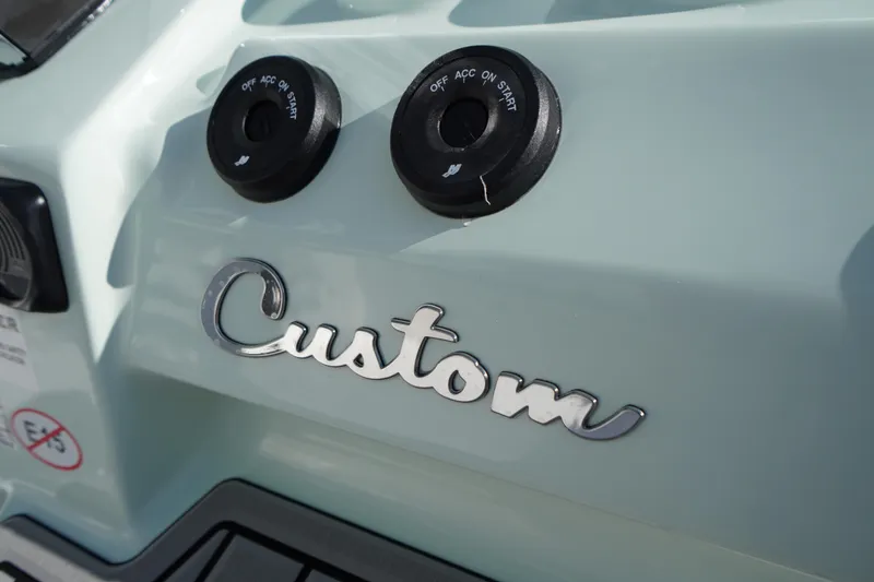 Slide: The Image of 2026 Tidewater 272 LXF boat with custom detailing and ignition switches. - 37