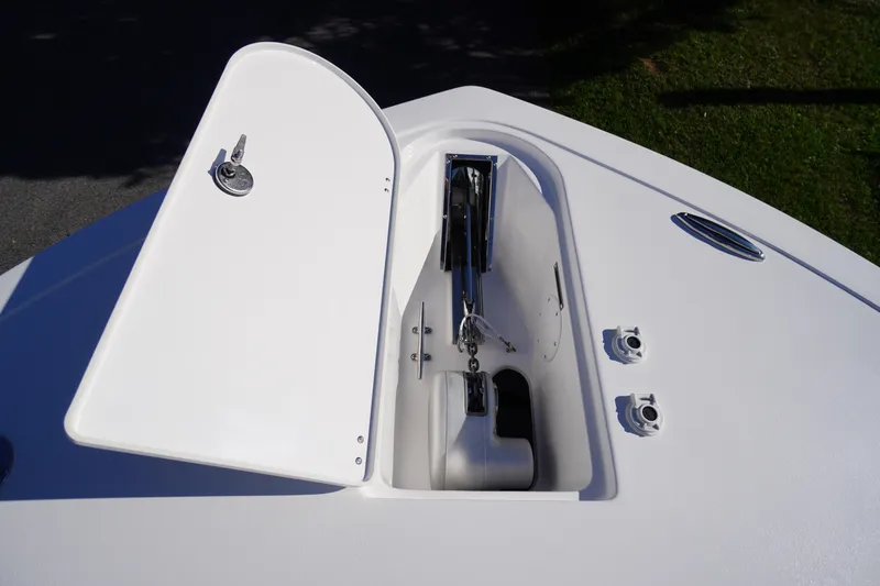 Slide: The Image of 2026 Tidewater 272 LXF boat anchor compartment with open hatch. - 6