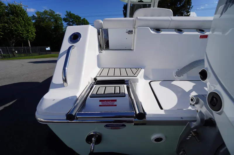 Slide: The Image of 2026 Tidewater 272 LXF boat stern with swim platform and ladder. - 77
