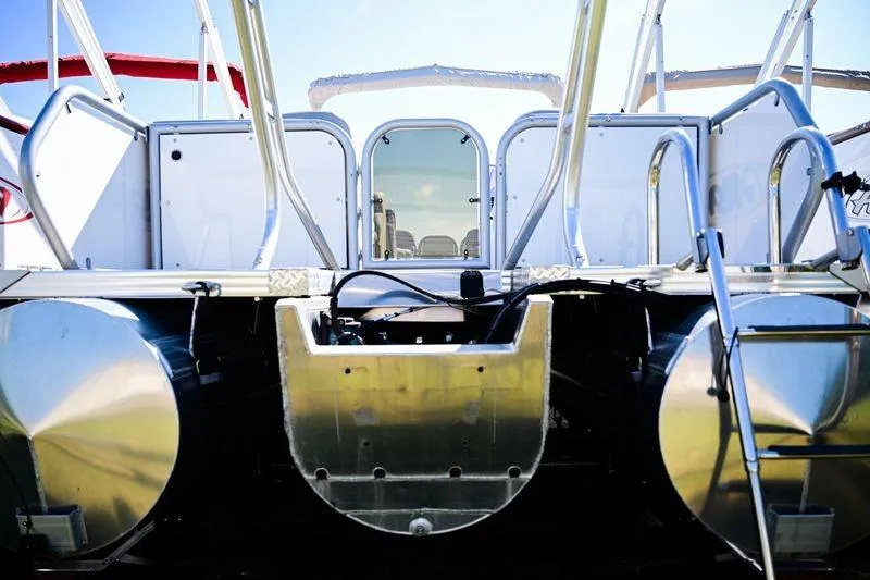Slide: The Image of 2023 Aloha Pontoon Mahalo 23 boat rear view with aluminum structure and seating. - 4
