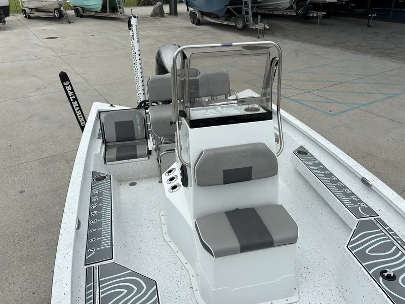 Slide: The Image of 2020 Xpress H20 B boat interior with seating and measuring guides. - 14