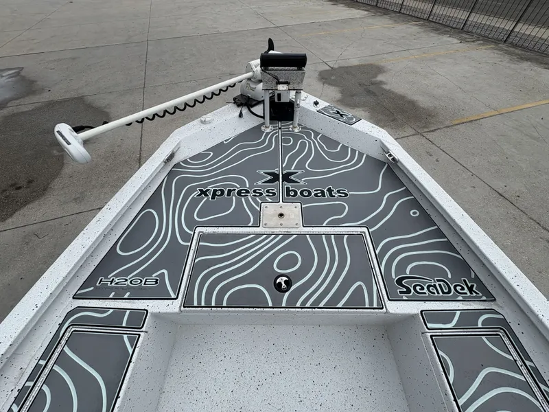 Slide: The Image of 2020 Xpress H20 B boat deck with SeaDek flooring and trolling motor. - 8
