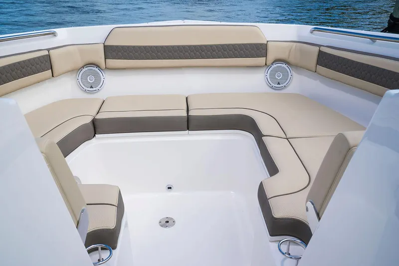 Slide: The Image of Manufacturer Provided Image: 2025 Pursuit DC 365 Dual Console boat interior with cushioned seating. - 6