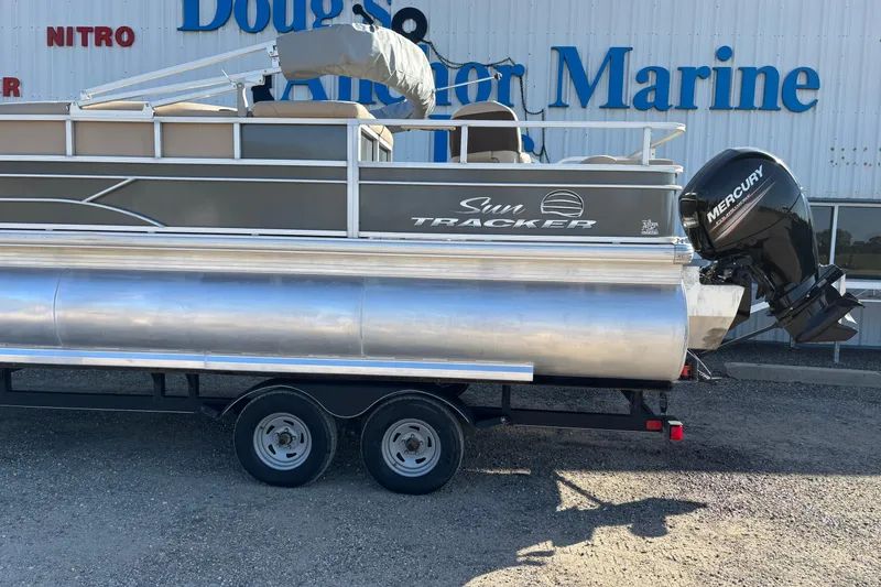 Slide: The Image of 2017 Sun Tracker Fishin' Barge 22 XP3 pontoon boat with Mercury outboard motor. - 9