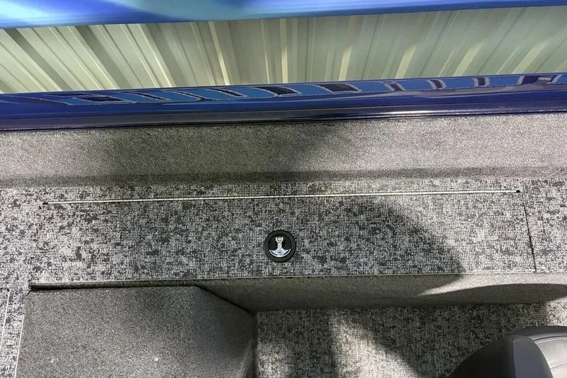 Slide: The Image of Interior view of 2026 Tracker Pro Guide V-175 Combo boat, featuring textured flooring. - 25