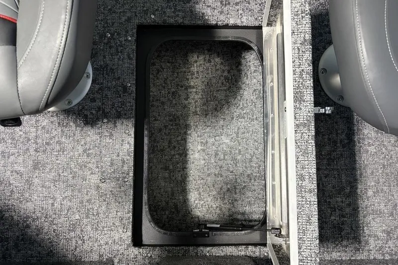 Slide: The Image of 2026 Tracker Pro Guide V-175 Combo boat interior with open storage compartment. - 26