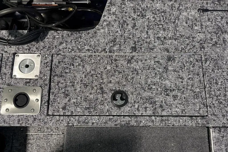 Slide: The Image of 2026 Tracker Pro Guide V-175 Combo boat deck with storage compartment and fittings. - 32