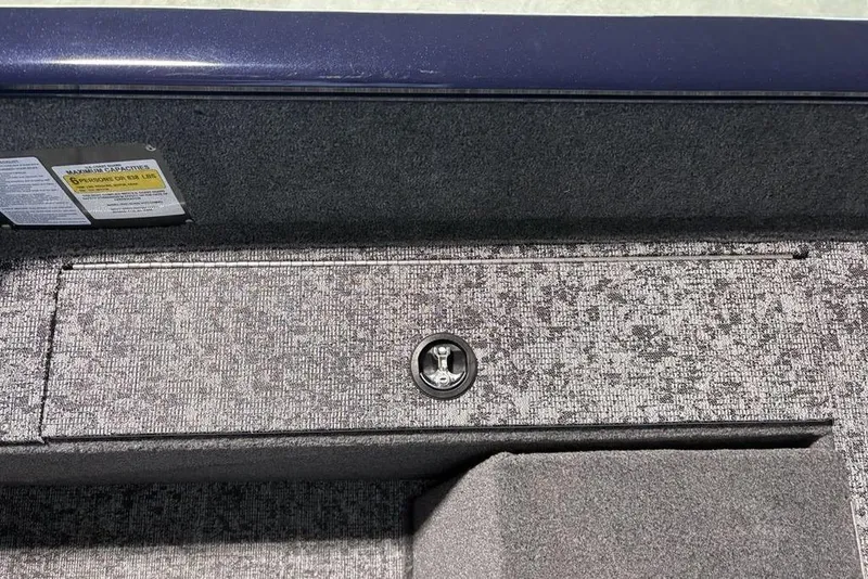 Slide: The Image of 2026 Tracker Pro Guide V-175 Combo boat interior storage compartment with textured finish. - 35