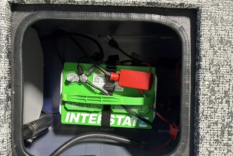 Slide: The Image of Battery compartment of 2026 Tracker Pro Guide V-175 Combo boat. - 38