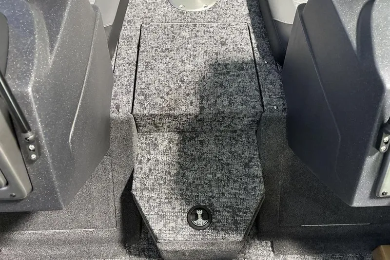 Slide: The Image of Interior of 2026 Tracker Pro Guide V-175 Combo boat, featuring carpeted flooring. - 7
