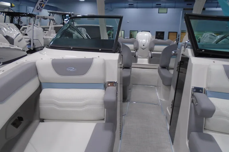 Slide: The Image of 2026 Regal LX6 boat interior with luxurious seating and modern design. - 17