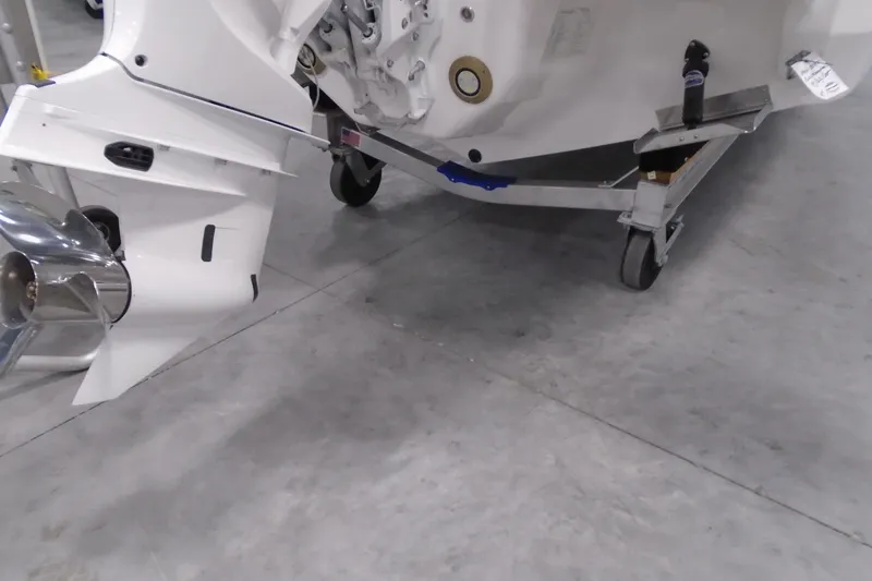 Slide: The Image of 2026 Regal LX6 boat propeller and engine on a workshop floor. - 24