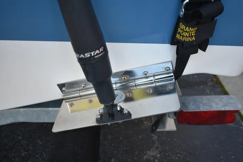 Slide: The Image of Close-up of Sea Pro 245 Sandbar 2025 boat's hydraulic steering and mounting hardware. - 23