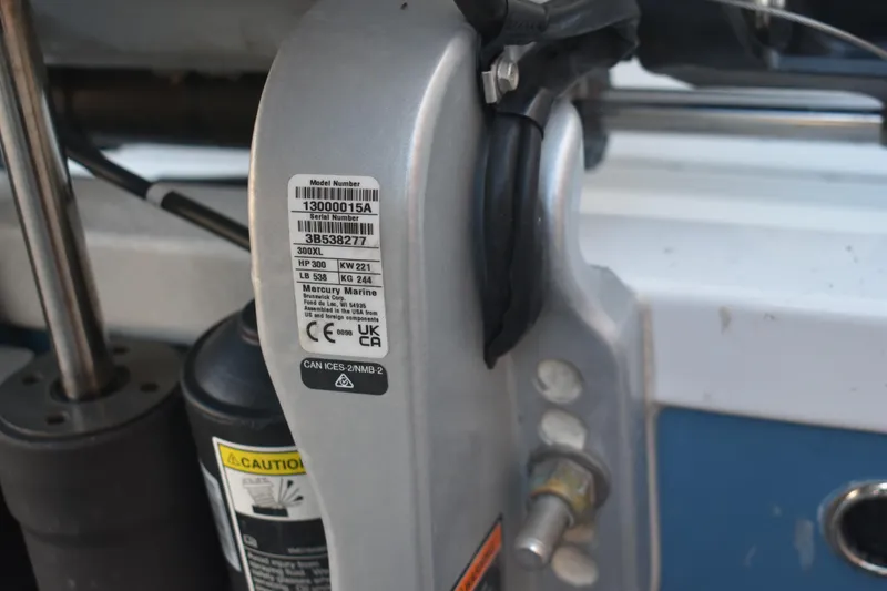 Slide: The Image of Label on a 2025 Sea Pro 245 Sandbar boat engine, showing model and serial numbers. - 25
