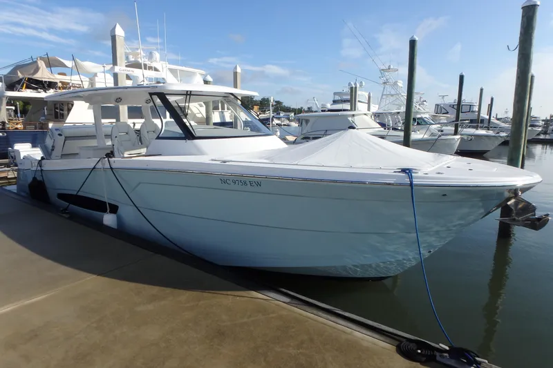 Slide: The Image of Interior view of 2022 Regal 38 SAV boat with modern seating and controls. - 2