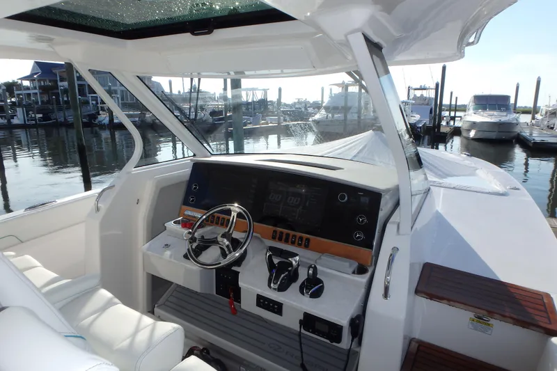 Slide: The Image of 2022 Regal 38 SAV boat interior with spacious seating and modern design. - 4