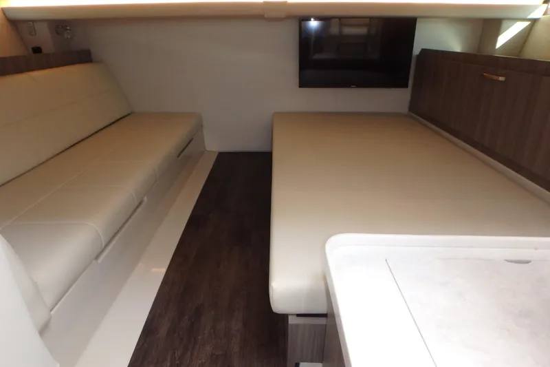 Slide: The Image of 2022 Regal 38 SAV boat interior with sleek design and modern amenities. - 6