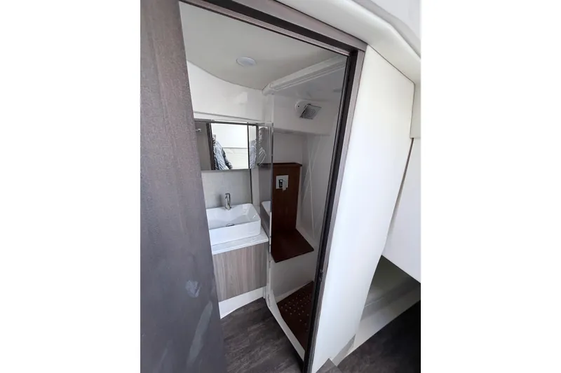 Slide: The Image of 2022 Regal 38 SAV bathroom interior with sink and shower. - 8