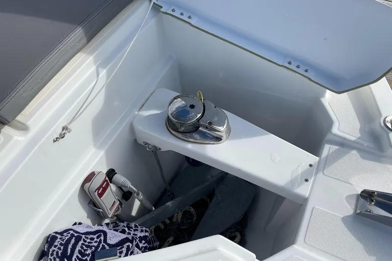 Slide: The Image of Anchor compartment of 2020 Beneteau Antares 23 boat with winch and accessories. - 18