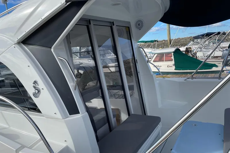 Slide: The Image of 2020 Beneteau Antares 23 boat with sleek design at marina. - 23