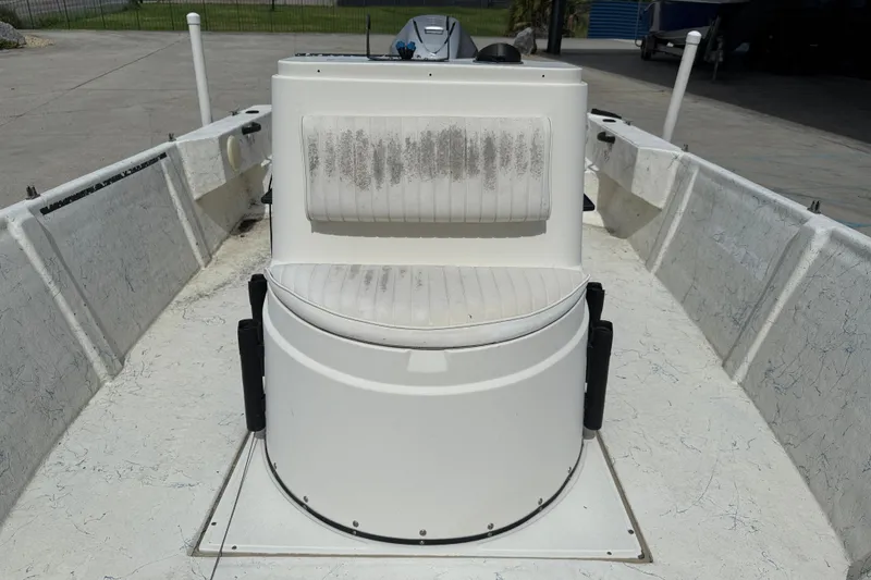 Slide: The Image of 1998 Hydra-Sports 22 Ocean CC boat interior with Honda 200 engine, white seating. - 11