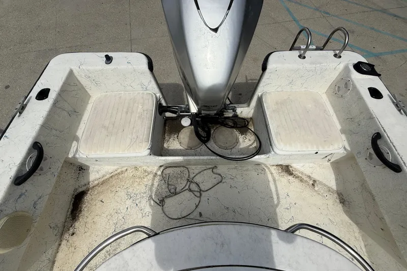 Slide: The Image of 1998 Hydra-Sports 22 Ocean CC boat console with steering wheel and gauges. - 14