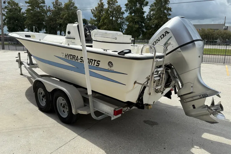 Slide: The Image of 1998 Hydra-Sports 22 Ocean CC boat with outboard motor, rear view. - 5