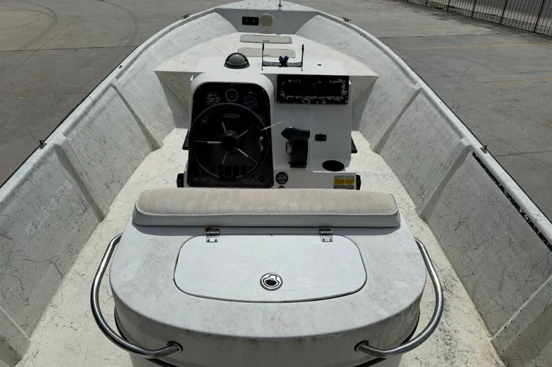 Slide: The Image of 1998 Hydra-Sports 22 Ocean CC boat interior with storage compartments and seating. - 8