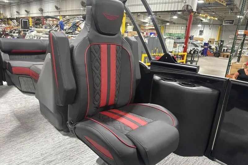 Slide: The Image of Luxurious seating on 2026 Bennington 24 MFBSF boat, featuring red and black upholstery. - 13