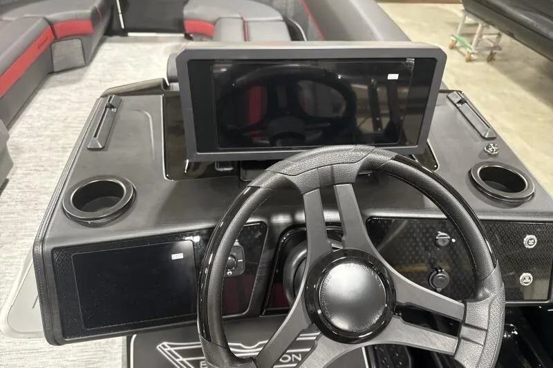 Slide: The Image of Steering console of 2026 Bennington 24 MFBSF boat with modern dashboard and seating. - 20