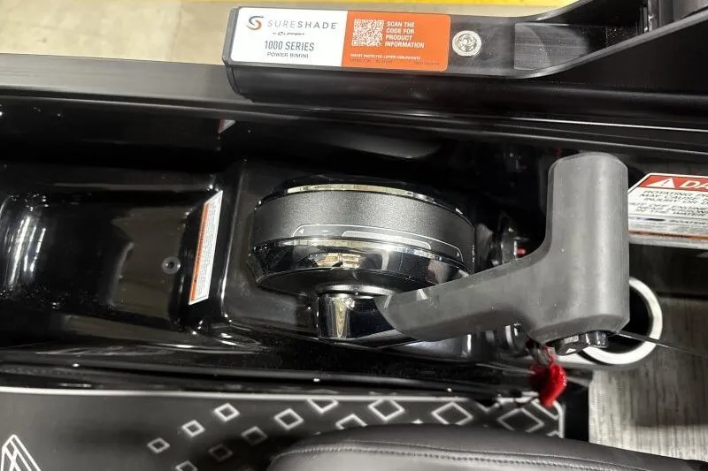 Slide: The Image of Close-up of 2026 Bennington 24 MFBSF boat control panel with SureShade 1000 Series power bimini. - 21