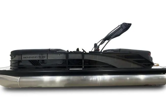 Slide: The Image of 2026 Bennington 24 MFBSF pontoon boat, sleek black design, side view. - 7