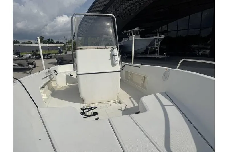 Slide: The Image of 2000 Hydra-Sports 18cc boat console with steering wheel and instrument panel. - 12