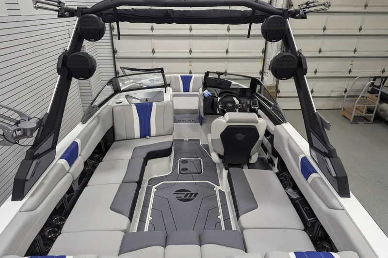Slide: The Image of 2026 Malibu Wakesetter 22 LSV interior with sleek seating and advanced dashboard features. - 21