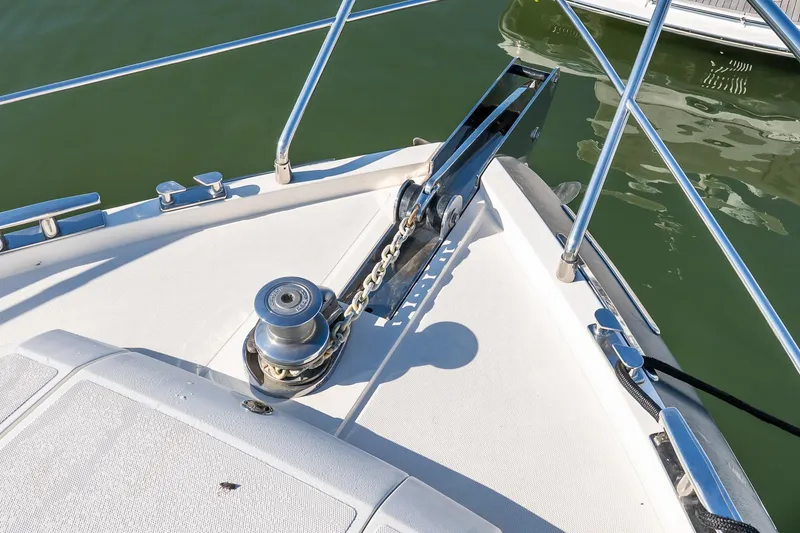 Slide: The Image of Bow of 2011 Uniesse 55S yacht with anchor chain and winch system. - 43