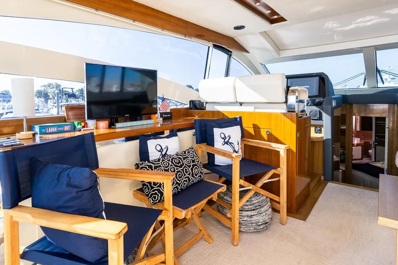 Slide: The Image of Luxurious interior of 2011 Uniesse 55S yacht with elegant seating and modern decor. - 19