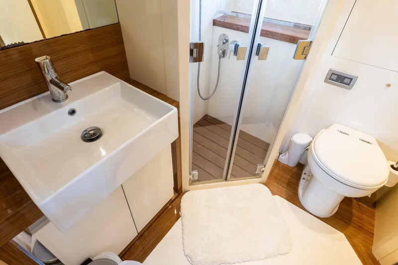 Slide: The Image of Luxurious bathroom in 2011 Uniesse 55S yacht with modern fixtures and shower. - 35