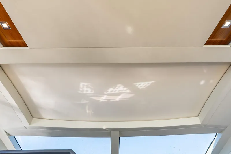Slide: The Image of Interior ceiling view of 2011 Uniesse 55S yacht with modern lighting. - 17