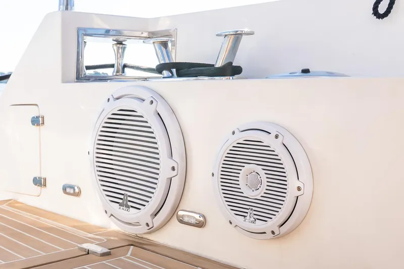 Slide: The Image of Speakers on 2011 Uniesse 55S yacht deck, featuring JL Audio components. - 5