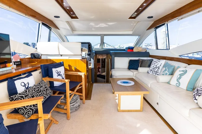 Slide: The Image of Luxurious interior of 2011 Uniesse 55S yacht with elegant seating and nautical decor. - 16