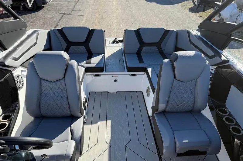 Slide: The Image of Interior of 2026 Yamaha Boats 222XD, featuring modern seating and sleek design. - 11