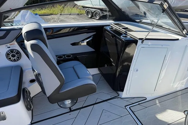 Slide: The Image of Interior of 2026 Yamaha Boats 222XD, featuring sleek seating and modern design elements. - 9